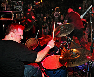 NOV. 18, 2005. CBGB. GERRY PULVERIZING THE CBGB DRUM KIT.